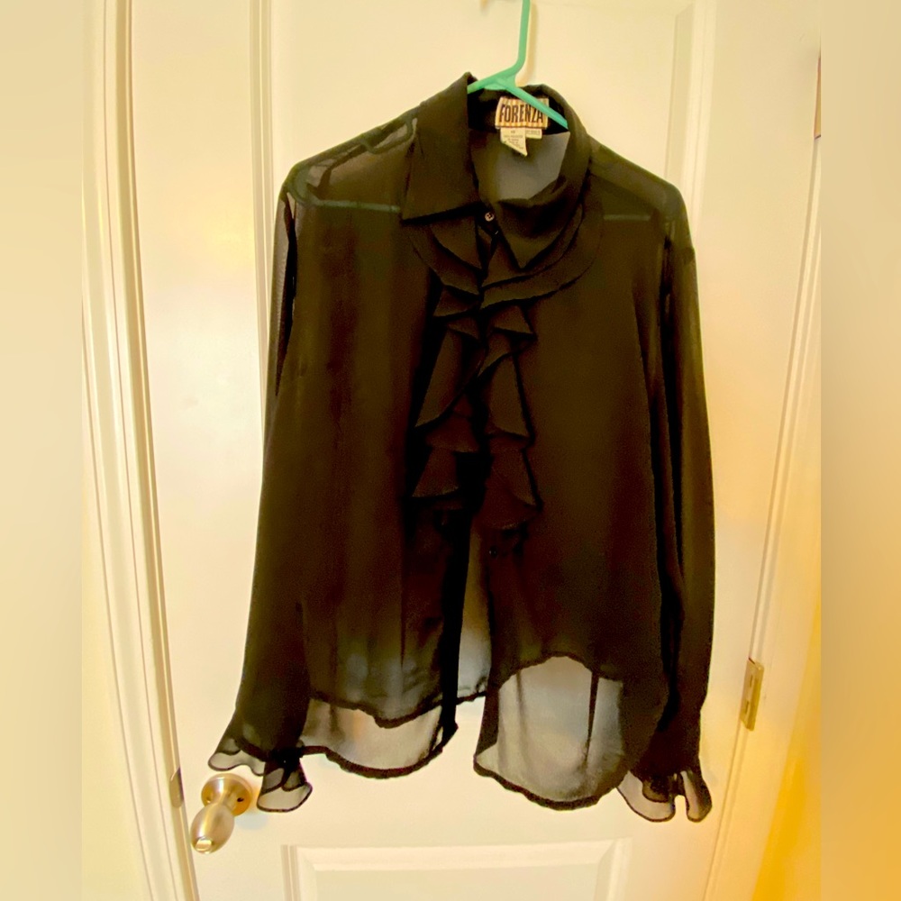 100% polyester sheer blouse in size 18